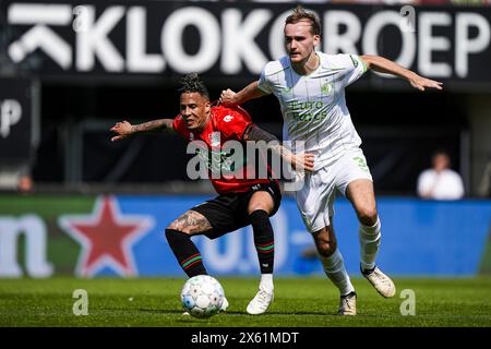 Nimègue, pays-Bas. 12 mai 2024. Nimègue - Tjaronn Chery de NEC Nimègue, Thomas Beelen de Feyenoord lors du match Eredivisie entre NEC contre Feyenoord au Goffertstadion le 12 mai 2024 à Nimègue, pays-Bas. Crédit : Box to Box Pictures/Alamy Live News Banque D'Images