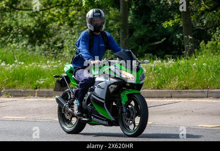 Milton Keynes, Royaume-Uni - 11 mai 2024 : 2020 Lexmoto ZSX 125 cc moto sur une route britannique Banque D'Images