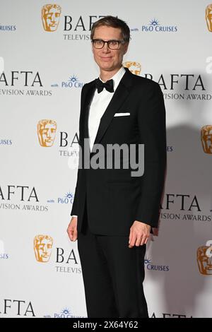 Royal Festival Hall, LONDRES, ANGLETERRE, Royaume-Uni - 12 MAI 2024 : les présentateurs du Prix de la série dramatique Stephen Merchant posent dans la salle des gagnants lors des BAFTA Television Awards 2024 avec P&O Cruises dans la salle des gagnants lors des BAFTA Television Awards 2024 avec P&O Cruises, Londres, Royaume-Uni. Crédit : Voir Li/Picture Capital/Alamy Live News Banque D'Images