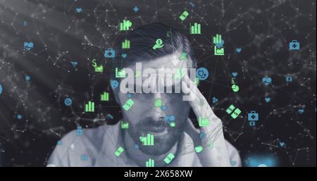 Image d'icônes et de points connectés formant des formes géométriques sur l'homme caucasien stressé Banque D'Images