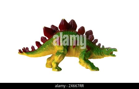 Modèle en plastique réaliste d'un dinosaure Stegosaurus sur fond blanc. Banque D'Images