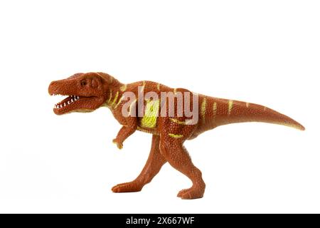 Réplique de jouet détaillée d'un tyrannosaurus rex positionné sur un fond blanc sans couture, adapté au contenu éducatif Banque D'Images