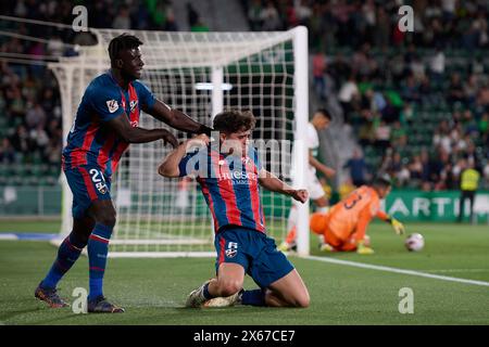 Elche, Espagne. 13 mai 2024. ELCHE, ESPAGNE - 12 MAI : Javi Mier milieu de terrain central de SD Huesca célèbre après avoir marqué le troisième but de son équipe lors du match LaLiga Hypermotion entre Elche CF et SD Huesca au stade Manuel Martinez Valero, le 12 mai 2024 à Elche, Alicante, Espagne. (Photo de Francisco Macia/photo Players images) crédit : Magara Press SL/Alamy Live News Banque D'Images