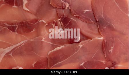 jamon serrano ou iberico, fond de texture de jambon espagnol, traditionnel prosciutto tranché, jambon de viande séché Banque D'Images