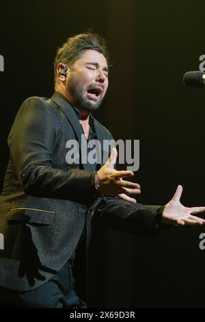 Le chanteur Miguel Poveda se produit lors d'un concert au théâtre Lope de Vega à Madrid, le 13 mai 2024 Espagne. Banque D'Images