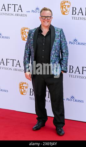 LONDRES, ANGLETERRE - 12 MAI : Olly Smith assiste aux BAFTA Television Awards 2024 avec P&O Cruises au Royal Festival Hall de Londres, en Angleterre. Crédit : Voir Li/Picture Capital/Alamy Live News Banque D'Images