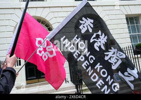 Londres, Royaume-Uni, 14 mai 2024. Les Hongkongais ont organisé une manifestation d'urgence devant le Hong Kong Economic & Trade Office (HKETO) après que trois hommes ont été accusés d'avoir aidé le service de renseignement étranger de l'ancienne colonie britannique au Royaume-Uni. Les manifestants ont appelé le gouvernement britannique à faire plus, les activistes déclarant qu'ils sont confrontés à la répression transnationale et à l'intimidation de la part de la Chine. Crédit : onzième heure photographie/Alamy Live News Banque D'Images