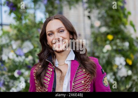 14 mai 2024, Rhénanie-du-Nord-Westphalie, Kšln : Riccardo Simonetti, présentateur, vient au Flora pour présenter la troisième saison de la série Netflix 'Bridgerton'. Photo : Rolf Vennenbernd/dpa Banque D'Images