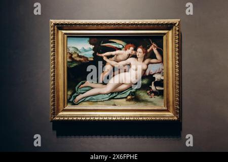 Florence, Italie - 29 décembre 2023 : peinture de 'Vénus désarmant Cupidon' par Alessandro Allori, 1570, dans la Galerie des Offices Banque D'Images