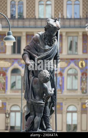 Sculpture de la fontaine Leopoldsbrunnen construite en 1680 par Johann Frühwirt située rue Graben à Vienne avec le célèbre bâtiment « Zur Weltkugel » Banque D'Images