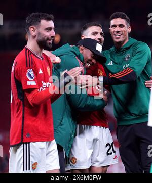 Bruno Fernandes, Anthony Martial, Diogo Dalot et Raphael Varane (gauche-droite) de Manchester United après le match de premier League à Old Trafford, Manchester. Date de la photo : mercredi 15 mai 2024. Banque D'Images