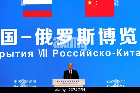 Harbin, Chine. 17 mai 2024. Le président russe Vladimir Poutine prononce un discours à l’ouverture de l’EXPO Russie-Chine et du Forum Russie-Chine sur la coopération interrégionale, le 17 mai 2024, à Harbin, en Chine. Crédit : Planetpix/Alamy Live News Banque D'Images