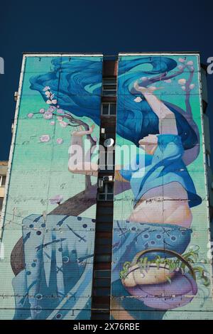Un très grand graffiti sur un mur Banque D'Images