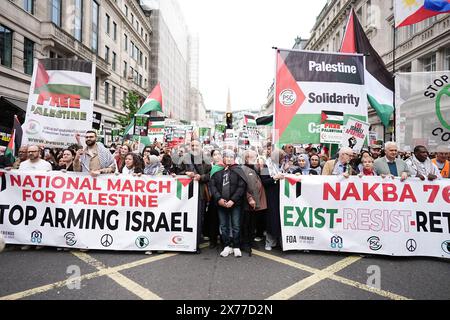 Les gens prennent part à une manifestation pro-palestinienne Nakba 76 et marchent à Londres pour marquer le déplacement massif de Palestiniens en 1948, appelé Nakba. Date de la photo : samedi 18 mai 2024. Banque D'Images