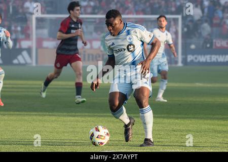 Toronto, Canada. 18 mai 2024. Sunusi Ibrahim #14 vu en action lors du match de la MLS entre Toronto FC et CF Montréal au BMO Field. Scores finaux ; Toronto 5:1 Montréal. Crédit : SOPA images Limited/Alamy Live News Banque D'Images
