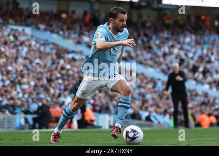 Bernardo Silva de Manchester City sur le ballon lors du match de premier League Manchester City vs West Ham United au stade Etihad, Manchester, Royaume-Uni, le 19 mai 2024 (photo par Mark Cosgrove/News images) à Manchester, Royaume-Uni le 19/05/2024. (Photo Mark Cosgrove/News images/SIPA USA) Banque D'Images