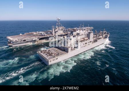 États-Unis. 25 avril 2024. Le porte-avions USS Harry S. Truman (CVN 75) de classe Nimitz se met en position avec le cargo de classe Lewis et Clark USNS Robert E. Peary (T-AKE 5), le 25 avril 2024. Truman est le navire amiral du Harry S. Truman Carrier Strike Group et est actuellement en cours dans le cadre de la phase de base. (Image de crédit : © Mike Shen/U.S. Navy/ZUMA Press Wire) USAGE ÉDITORIAL UNIQUEMENT ! Non destiné à UN USAGE commercial ! Banque D'Images