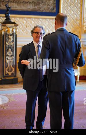 M. Ian Russell, président du conseil d'administration de la Fondation Molly Rose, est nommé membre de l'ordre de l'Empire britannique par le prince de Galles au château de Windsor. L'honneur récompense les services à la sécurité des enfants en ligne. Date de la photo : mercredi 22 mai 2024. Banque D'Images