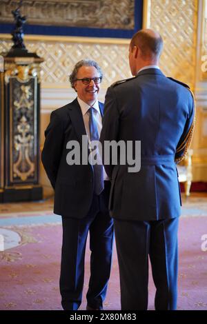 M. Ian Russell, président du conseil d'administration de la Fondation Molly Rose, est nommé membre de l'ordre de l'Empire britannique par le prince de Galles au château de Windsor. L'honneur récompense les services à la sécurité des enfants en ligne. Date de la photo : mercredi 22 mai 2024. Banque D'Images