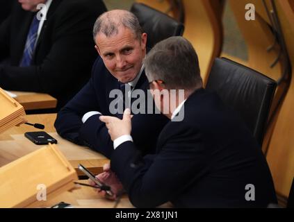 Michael Matheson MSP en tant que premier ministre John Swinney prononce une déclaration sur les priorités pour l'Écosse devant le Parlement écossais à Holyrood, Édimbourg, pour engager le gouvernement écossais à éradiquer la pauvreté des enfants et à travailler avec les entreprises et l'industrie pour faire croître l'économie, investir dans le zéro net et fournir des services publics plus solides. Date de la photo : mercredi 22 mai 2024. Banque D'Images