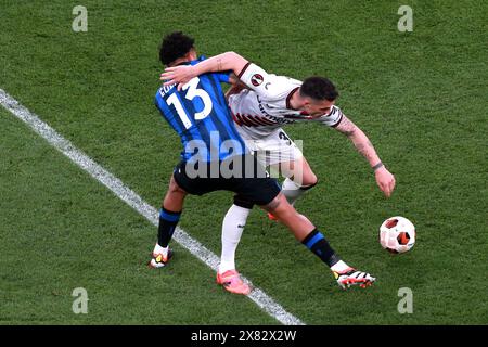 Jose Ederson Silva d'Atalanta (à gauche) et granit Xhaka de Bayer Leverkusen s'affrontent pour le ballon lors de la finale de l'UEFA Europa League à l'Aviva Stadium de Dublin. Date de la photo : mercredi 22 mai 2024. Banque D'Images