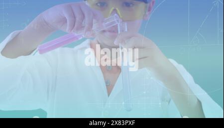 Image d'équations mathématiques sur un garçon caucasien en laboratoire Banque D'Images