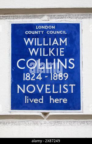 Londres, Royaume-Uni - 4 mars 2024 : une plaque bleue sur Gloucester place à Londres, Royaume-Uni, marquant l'endroit où vivait le romancier William Wilkie Collins. Banque D'Images
