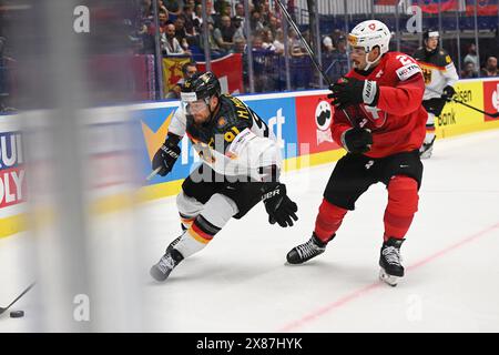 Ostrava, République tchèque. 23 mai 2024. Match de quart de finale Suisse vs Allemagne du Championnat mondial 2024 de l’IIHF, à Ostravar Arena, Ostrava, République tchèque, le 23 mai, 2024. g-R Moritz Muller (GER), Kevin Fiala (sui). Crédit : Jaroslav Ozana/CTK photo/Alamy Live News Banque D'Images