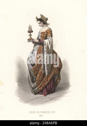 Noble à la cour du roi Charles VII de France, XVe siècle. En coiffe ailée, robe en demi brocart et soie avec fleurs-de-lys, manches suspendues. Cour de Charles VII, 1460. Gravure sur acier colorée à la main d’après une illustration de François Claudius compte-Calix tirée de l’album Keepsake des costumes de la cour française depuis Charles VII jusqu’à Louis XVI, album Keepsake of French court costumes from Charles VII to Louis XVI, modes Parisiennes, Paris, 1854. Banque D'Images