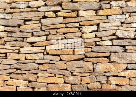 Fond naturel de texture de mur de pierres plates pour l'architecture et le design Banque D'Images