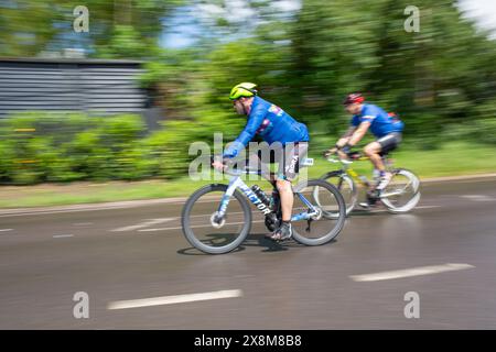 Brentwood, Royaume-Uni. 26 mai 2024. Partez à Londres en partant du centre de Londres, vous glisserez de Victoria Embankment dans le comté historique d'Essex via la forêt d'Epping, à travers de superbes villes et villages ruraux - dont Epping, Ongar, Great Dunmow, Felsted et Writtle - avant de pédaler jusqu'à une arrivée spectaculaire dans le centre de Londres crédit : Richard Lincoln/Alamy Live News Banque D'Images