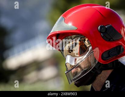 MONACO - Max Verstappen (Red Bull Racing) peut être vu dans le reflet d'un casque de pompier lors du Grand Prix de Monaco. ANP SEM VAN DER WAL Banque D'Images