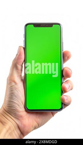 Une main tient un smartphone avec un écran vert sur fond blanc. IA, génération, illustration. Banque D'Images