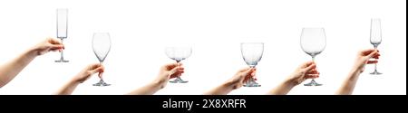 Main de femme tenant un verre à cocktail vide isolé sur fond blanc. Banque D'Images