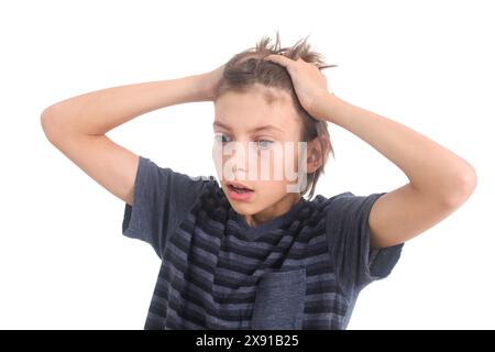 stressé preteen boy sur fond blanc Banque D'Images