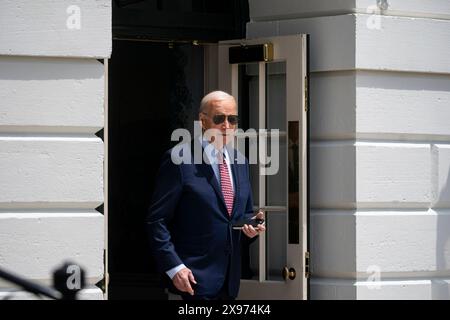 Washington, États-Unis. 29 mai 2024. Le président AMÉRICAIN Joe Biden sort de la Maison Blanche avant d'embarquer sur Marine One à Washington, DC, États-Unis, le mercredi 29 mai, 2024. mardi, la Maison Blanche a déclaré qu'une frappe israélienne sur un campement à Rafah, qui avait fait des dizaines de morts, était dévastatrice mais n'obligerait pas le Président Joe Biden à geler d'autres livraisons d'armes à destination du pays. Photographe : Al Drago/Pool/Sipa USA crédit : Sipa USA/Alamy Live News Banque D'Images