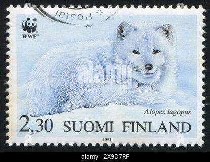FINLANDE - VERS 1993 : timbre imprimé par la Finlande, représentant un renard arctique, vers 1993 Banque D'Images