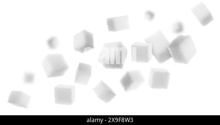 Cubes de sucre raffiné dans l'air sur fond blanc Banque D'Images