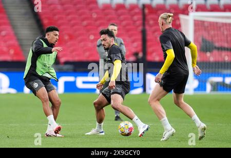 Jaydon Sancho et Mats Hummels du Borussia Dortmund lors d'une séance d'entraînement au stade de Wembley à Londres, avant la finale de la Ligue des Champions samedi 1er juin. Date de la photo : vendredi 31 mai 2024. Banque D'Images