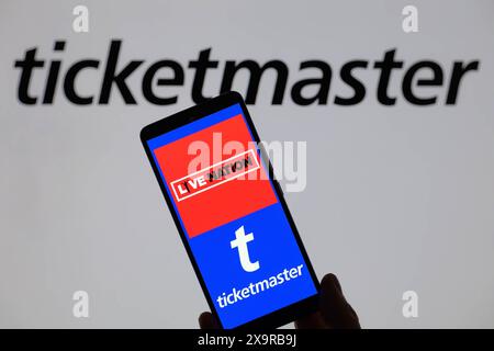 Bruxelles, Belgique. 02 juin 2024. Le logo Live Nation est affiché sur un smartphone avec Ticketmaster visible à l'écran en arrière-plan, sur cette illustration photo. Prise à Bruxelles, Belgique. Le 2 juin 2024. (Jonathan Raa/Sipa USA) *** strictement à des fins éditoriales *** crédit : Sipa USA/Alamy Live News Banque D'Images