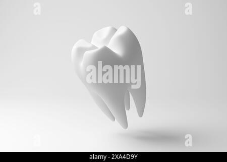 Dent molaire humaine blanche flottant à mi-air sur fond blanc en monochrome et minimalisme. Concept de santé dentaire et d'hygiène bucco-dentaire Banque D'Images