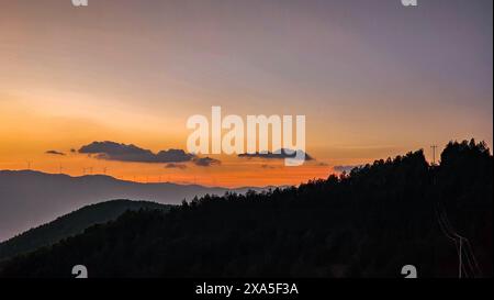 Un coucher de soleil sur Damakan dans le district de Dongchuan, Kunming City, Yunnan, Chine Banque D'Images