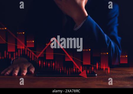 Les valeurs des propriétés ​​are sont en baisse constante. Homme d'affaires malheureux, ralentissement des affaires. les actions des entreprises chutent en valeur, crise économique, économie mondiale ralentit Banque D'Images