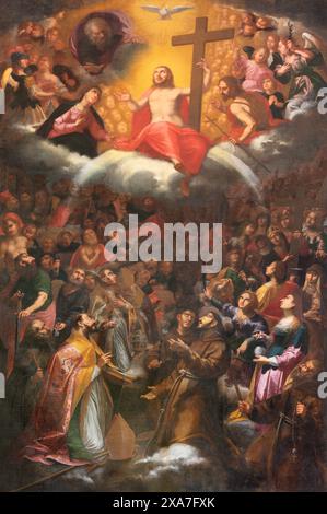 SPELLO, ITALIE - 18 MAI 2024 : la peinture de l'Adoration de la Sainte Trinité dans l'église Chiesa di San Severino par Giacinto Boccanera du 18. cent. Banque D'Images