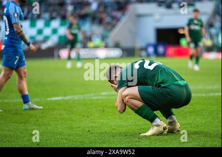 Footballeur après une fusillade manquante pendant le match de football. Banque D'Images