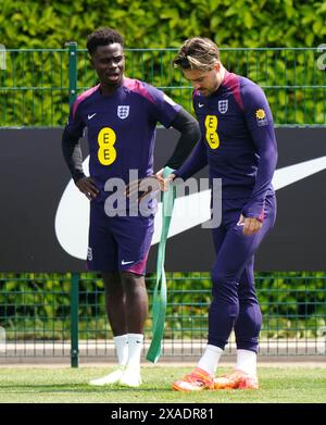 Les Anglais Bukayo Saka et Jack Grealish lors d'une séance d'entraînement à Tottenham Hotspur Training session, Londres. Date de la photo : jeudi 6 juin 2024. Banque D'Images