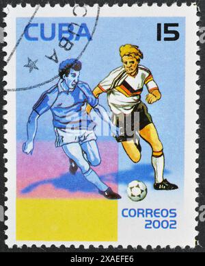 Timbre-poste oblitéré imprimé par Cuba, qui montre un joueur de football allemand, Coupe du monde de la FIFA 2002 - Corée et Japon, vers 2002. Banque D'Images