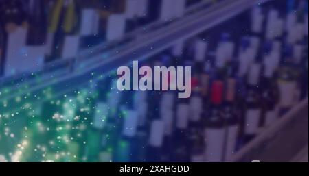 Image de lumières sur un magasin d'alcool flou en bleu Banque D'Images