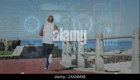 Image du traitement des données au-dessus de la vue arrière d'un homme afro-américain senior courant sur la promenade Banque D'Images