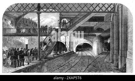 Nouveaux travaux sur le chemin de fer métropolitain : jonction des chemins de fer Midland, Great Northern et Metropolitan à King's-Cross, 1868. Les travaux supplémentaires récemment terminés sur que portion...between les stations King's Cross et Farringdon-Road sont d'une certaine importance, à la fois comme des réalisations remarquables de compétence constructive, et comme fournissant, le plus complètement et efficacement, pour le travail sûr et commode de la circulation. Cette section... doit être utilisée conjointement par le Metropolitan, le Great Western, le Midland, le Great Northern et Londres, Chatham, et les trains des compagnies de Douvres, étant posés avec des rails d'un M. Banque D'Images